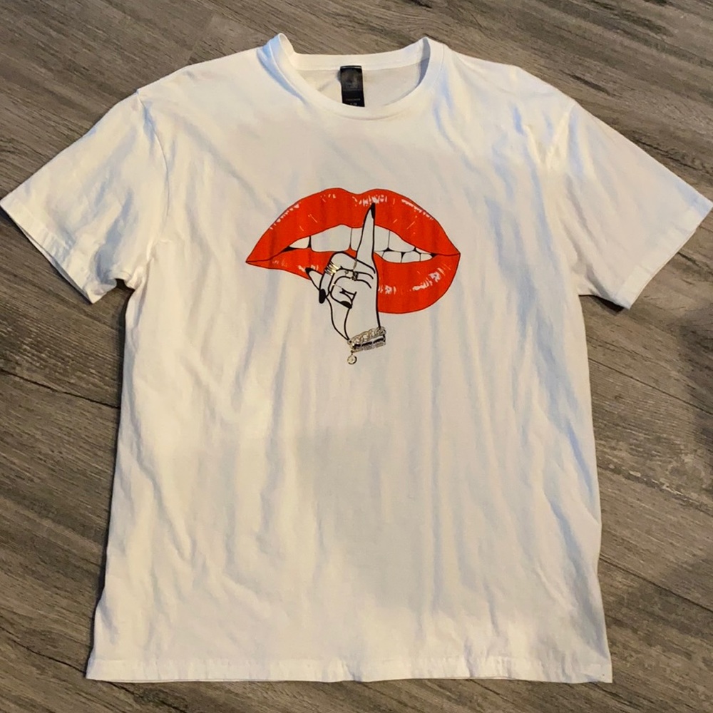 Brand new Lip designed tshirt. Oversized to tie up